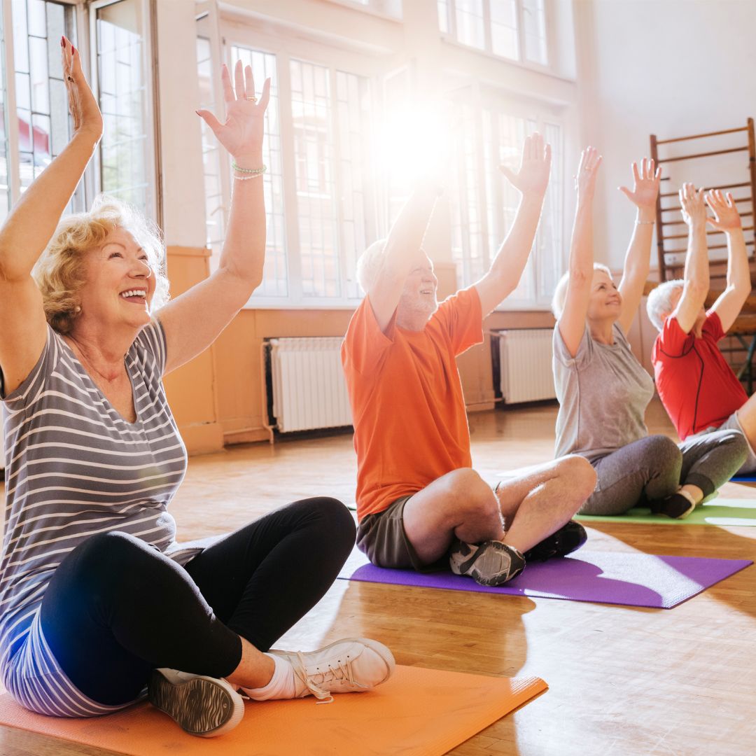 Seniors in a yoga class