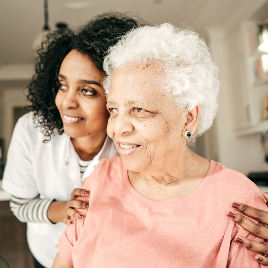 Hugging senior parent